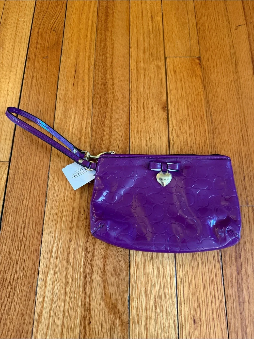 Coach Patent Purple Wristlet with Gold Heart Charm
